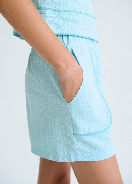 Conj. short puntada concha    Agua